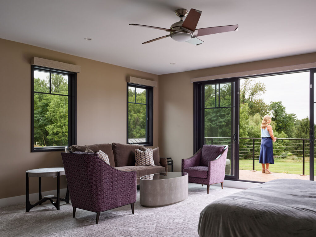 beautiful view from bedroom with comfortable sitting area and balcony